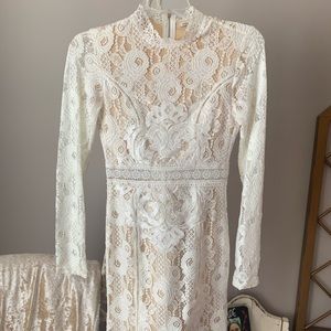 white lace form fitting dress